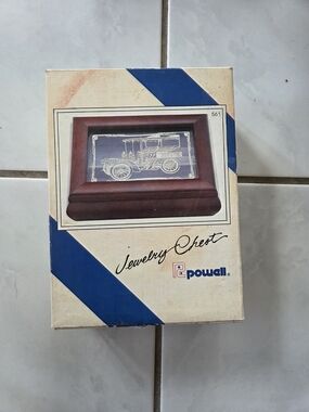 Powell brand vintage jewelry chest with a pewter Peugeot 1895 automobile